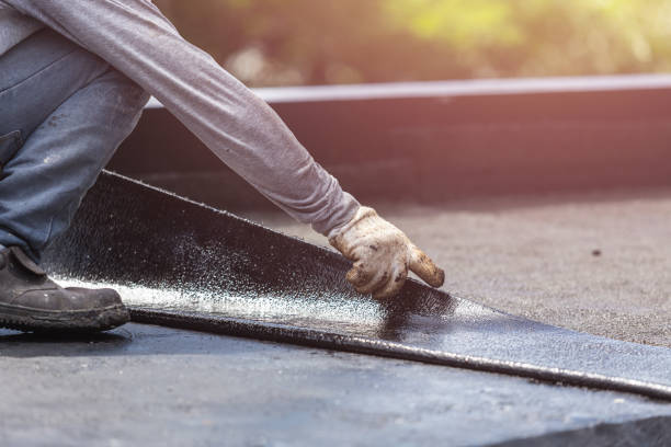 Professional Waterproofing technician working in Burkittsville, MD